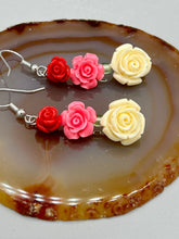 Load image into Gallery viewer, Crafted from quartzite, these highly detailed rose beads come in three striking shades of red, soft pink, and white beaded earrings. This is the ideal accessory for those interested in Dia De Los Muertos as well as those with an appreciation for gardens. Whether dressing up or down, these earrings will lend a distinctive touch to your fashion.  Measurements: 1 1/2” in length 
