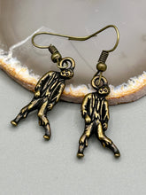 Load image into Gallery viewer, The Halloween-inspired Zombie Charm Antique Brass Earrings are crafted from Tierracast lead-free pewter and are the perfect complement to any look. Boasting fun spooky charms, these living dead earrings are a great way to celebrate the spooky season all year round.  Measurements: 1 ” in length
