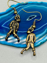 Load image into Gallery viewer, The Halloween-inspired Zombie Charm Antique Brass Earrings are crafted from Tierracast lead-free pewter and are the perfect complement to any look. Boasting fun spooky charms, these living dead earrings are a great way to celebrate the spooky season all year round.  Measurements: 1 ” in length
