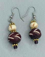 Load image into Gallery viewer, Crafted with large and small round bone beads, these gold-tone floral metal bead earrings come in a range of neutral colors. Their versatile design allows them to transition easily from casual to formal, offering a unique edge to any ensemble.  Measurements: 1 1/2 ” in length  
