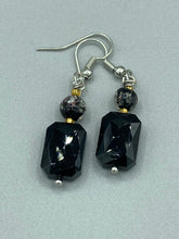 Load image into Gallery viewer, Elegantly crafted from black rectangular and circular glass beads, these dainty earrings offer a versatile style that can effortlessly elevate any ensemble.  Measurements: 1 3/8” in length
