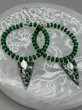 Load image into Gallery viewer, Green-White Qinghai Green Jasper Stone Beaded Hoop Earrings provide a nature-inspired look that is perfect for any boho-chic style. These earrings feature natural green jasper stone triangle pendant with small beads of silver and dark apple green magnesite stone for subtle accent. Show off your bohemian look with these eye-catching hoops.  Measurements: 3&quot; length 
