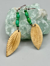 Load image into Gallery viewer, Single-stranded earring features bone carved leaf charm earrings with bright green magnesite stone beads. Antique Copper Plated Surgical Steel Hammered Long Ear-wire French Hook Earrings.  Measurements: 3” in length   
