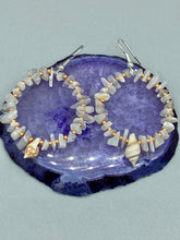 Load image into Gallery viewer, Delicate white moon stone chip and glass beaded hoop earrings featuring chic gold accents and tiny conch shells. Perfect for nature lovers, these boho-inspired summer earrings will add a subtle sophistication to any outfit.  Measurements: 2&quot; length
