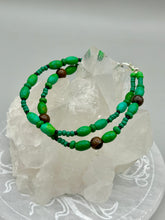 Load image into Gallery viewer, Nature inspired double-strand tigers eye and bright green magnesite stone beaded bracelet. Crafted with metal wire and fastened with a lobster claw clasp.  Measurements:  Bracelet: 7 3/4&quot; in length    
