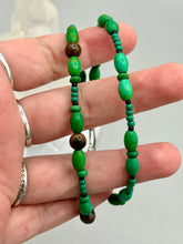Load image into Gallery viewer, Nature inspired double-strand tigers eye and bright green magnesite stone beaded bracelet. Crafted with metal wire and fastened with a lobster claw clasp.  Measurements:  Bracelet: 7 3/4&quot; in length    
