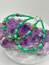 Load image into Gallery viewer, Nature inspired double-strand tigers eye and bright green magnesite stone beaded bracelet. Crafted with metal wire and fastened with a lobster claw clasp.  Measurements:  Bracelet: 7 3/4&quot; in length    
