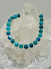 Load image into Gallery viewer, Nature inspired single-strand sea blue stripped agate round stone beaded with silver glass beaded bracelet. Crafted with metal wire and fastened with a lobster claw clasp.  Measurements:  Bracelet: 8&quot; in length   
