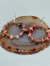 Load image into Gallery viewer, These Rhodonite Stone Chip Beaded Hoop Earrings feature natural rhodonite stones and light purple and gold glass beads for a shabby chic, boho chic, and nature-inspired bohemian look.  Measurements: 1&quot; length
