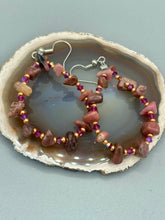 Load image into Gallery viewer, These pure rhodonite stone chip earrings with lustrous fuchsia and gold glass beading boast shimmering accents of blue, gold, and purple.  Measurements: 2 1/4&quot; length
