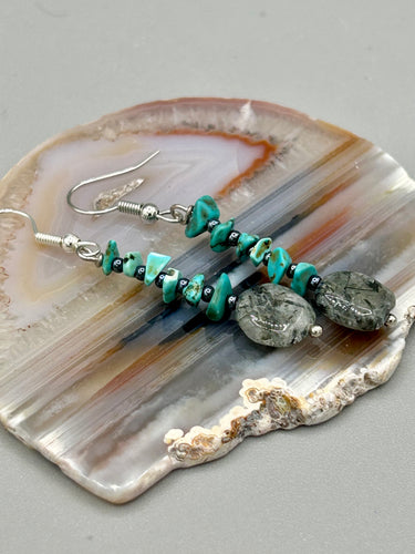 These earrings feature a single strand constructed with natural turquoise stone chips and tourmaline quartz stone beads for a unique, nature-inspired look.  Measurements: 1 1/2