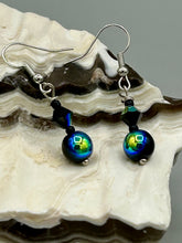 Load image into Gallery viewer, Elegantly crafted aurora borealis faceted glass beaded jewelry. These dainty earrings offer a versatile style that can effortlessly elevate any ensemble.  Measurements: 1” in length
