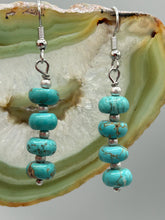 Load image into Gallery viewer, These earrings feature a single strand constructed with quartzite turquoise stone  and silver glass beaded earrings.  A pair of unique, nature-inspired look.  Measurements: 1 1/4" length
