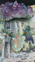 Load and play video in Gallery viewer, Large Stone Chip In Turquoise Color With Bronze Patina Cowry Beads, Beach And Sea Inspired Cowrie Shell
