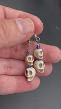 Load and play video in Gallery viewer, Mini Skull Earrings, Dangling Howlite Tiny Skull Beads With Blue Glass Bead, Pastel Goth, Mexican Dia De Los Muertos Calavera Aretes, Day of the Dead
