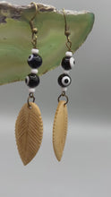Load and play video in Gallery viewer, Bone Carved Leaf Charm Earrings, Black And White Eye-Dot Glass Beaded Earrings, Evil Eyes

