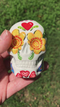 Load and play video in Gallery viewer, Mini Day of the Dead Ceramic Sugar Skull, Dia de Los Muertos Calavera de Azucar, Small Handpainted Nature Inspired Ceramic Sugar Skull Art
