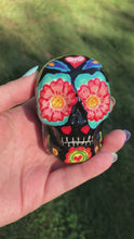 Load and play video in Gallery viewer, Mini Day of the Dead Black Ceramic Sugar Skull, La Muerte Calavera de Ofrenda, Dia De Los Muertos Calavera, Nature Inspired Hand Painted Skull Art
