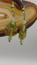 Load and play video in Gallery viewer, Dark Amber And Green Tone Pressed Glass Leaf Charm Beaded Earrings, Hippie Vibe, Nature Inspired
