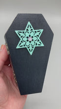 Load and play video in Gallery viewer, Whimsical Black Wood Coffin Ring Box And Spooky But Cute Misfit VooDoo Doll

