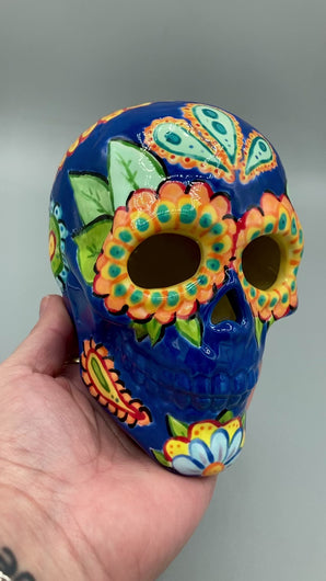 Royal Blue Ceramic Sugar Skull. I wanted to create a Dia De Los Muertos skull that represented the eternal love for a special kitty cat in your life. Black cat silhouette is sitting admiring the sun going down. This Day Of The Dead ceramic skull art was created for the cat lovers who adore their sweet kitty. Measurements: H 4” x W 4” x D 5 1/2”