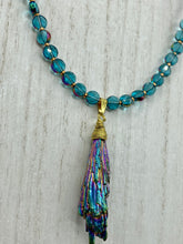 Load image into Gallery viewer, This necklace boasts a stunning Rainbow Kyanite wired stone pendant and two strands of shimmering glass beads. The blues contain hues of pink, gold, blue and green, offering a vibrant and bold addition to any jewelry collection.  Measurements:  Necklace is 17” in length, can be adjusted to 18&quot;
