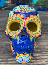 Load image into Gallery viewer, I wanted to create a Dia De Los Muertos skull that represented the eternal love for a special kitty cat in your life. Black cat silhouette is sitting admiring the sun going down. This Day Of The Dead ceramic skull art was created for the cat lovers who adore their sweet kitty. Measurements: H 4” x W 4” x D 5 1/2”
