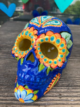 Load image into Gallery viewer, I wanted to create a Dia De Los Muertos skull that represented the eternal love for a special kitty cat in your life. Black cat silhouette is sitting admiring the sun going down. This Day Of The Dead ceramic skull art was created for the cat lovers who adore their sweet kitty. Measurements: H 4” x W 4” x D 5 1/2”
