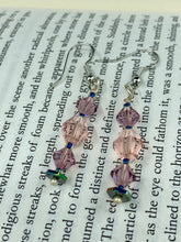 Load image into Gallery viewer, These dainty glass beaded earrings in soft pink and purple, featuring rainbow hematite beads, are perfect for summer ensembles and boho chic looks. An ideal accessory for nature lovers, these earrings will enhance any style.  Measurements: 1 1/2” in length
