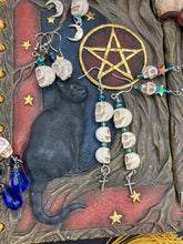 Load image into Gallery viewer, Dangling Skulls With Crosses Earrings, Pastel Goth Skulls And Crosses Jewelry, Dia De Los Muertos Aretes, Day of the Dead Jewelry, Fish Hook
