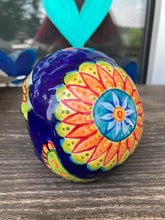 Load image into Gallery viewer, I wanted to create a skully that represented the eternal love for a special kitty cat in your life. Dark royal blue ceramic sugar skull with black cat silhouette is sitting admiring the sun going down. This Day Of The Dead ceramic skull art was created for the cat lovers who adore their sweet kitty. Measurements: H 4” x W 4” x D 5 1/2”
