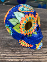 Load image into Gallery viewer, I wanted to create a Dia De Los Muertos skull that represented the eternal love for a special kitty cat in your life. Black cat silhouette is sitting admiring the sun going down. This Day Of The Dead ceramic skull art was created for the cat lovers who adore their sweet kitty. Measurements: H 4” x W 4” x D 5 1/2”
