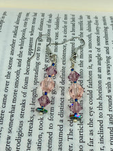 Load image into Gallery viewer, These dainty glass beaded earrings in soft pink and purple, featuring rainbow hematite beads, are perfect for summer ensembles and boho chic looks. An ideal accessory for nature lovers, these earrings will enhance any style.  Measurements: 1 1/2” in length
