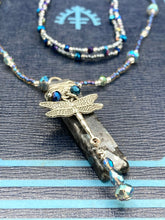 Load image into Gallery viewer, This stunning rectangular-shaped Black Labradorite Stone necklace features a wire-wrapped dragonfly pendant, completed with intricate glass bead detailing. Perfect for a summer night, it will make a bold statement.  Measurements: Necklace is 16” adjustable up to 18&quot;
