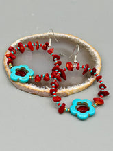 Load image into Gallery viewer, These Bamboo coral red stone chip earrings feature a subtle hoop design adorned with tiny turquoise, red, and gold glass beads. Completing the look is a turquoise flower pendant with a dark red glass bead in the center. Measurements: 2&quot; length 
