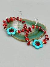 Load image into Gallery viewer, These Bamboo coral red stone chip earrings feature a subtle hoop design adorned with tiny turquoise, red, and gold glass beads. Completing the look is a turquoise flower pendant with a dark red glass bead in the center. Measurements: 2&quot; length 
