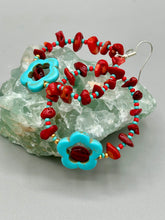 Load image into Gallery viewer, These Bamboo coral red stone chip earrings feature a subtle hoop design adorned with tiny turquoise, red, and gold glass beads. Completing the look is a turquoise flower pendant with a dark red glass bead in the center.  Measurements: 2" length 
