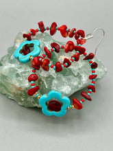 Load image into Gallery viewer, These Bamboo coral red stone chip earrings feature a subtle hoop design adorned with tiny turquoise, red, and gold glass beads. Completing the look is a turquoise flower pendant with a dark red glass bead in the center. Measurements: 2&quot; length 
