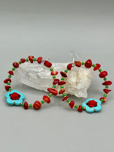 Load image into Gallery viewer, These bamboo coral red stone chip earrings feature tiny turquoise, green, and gold glass beading. Accenting the vibrant design is a turquoise flower pendant with quartzite rose beads for added detail.  Measurements: 2 1/4" length 
