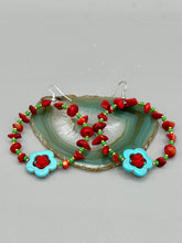 Load image into Gallery viewer, These bamboo coral red stone chip earrings feature tiny turquoise, green, and gold glass beading. Accenting the vibrant design is a turquoise flower pendant with quartzite rose beads for added detail. Measurements: 2 1/4&quot; length 
