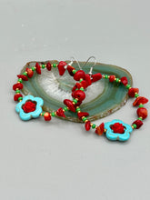 Load image into Gallery viewer, These bamboo coral red stone chip earrings feature tiny turquoise, green, and gold glass beading. Accenting the vibrant design is a turquoise flower pendant with quartzite rose beads for added detail. Measurements: 2 1/4&quot; length 
