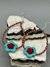 Load image into Gallery viewer, These gorgeous turquoise magnesite floral beaded earrings exude a hippie-style and shabby-chic vibe. The beautiful turquoise magnesite beads are decorated with quartzite rose beads and red, turquoise, and gold glass beads, giving a unique and nature-inspired look that is perfect for Bohemian fashion. Measurements: 2 1/2" length 
