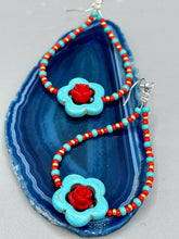 Load image into Gallery viewer, These gorgeous turquoise magnesite floral beaded earrings exude a hippie-style and shabby-chic vibe. The beautiful turquoise magnesite beads are decorated with quartzite rose beads and red, turquoise, and gold glass beads, giving a unique and nature-inspired look that is perfect for Bohemian fashion. Measurements: 2 1/2" length 
