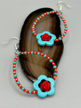 Load image into Gallery viewer, These gorgeous turquoise magnesite floral beaded earrings exude a hippie-style and shabby-chic vibe. The beautiful turquoise magnesite beads are decorated with quartzite rose beads and red, turquoise, and gold glass beads, giving a unique and nature-inspired look that is perfect for Bohemian fashion. Measurements: 2 1/2" length 
