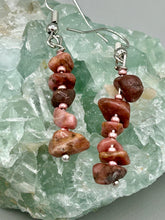 Load image into Gallery viewer, These earrings feature a single strand constructed with natural rhodonite stone chips and delicate pink glass beads for a unique, nature-inspired look. Measurements: 1 1/2&quot; length
