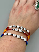 Load image into Gallery viewer, Rainbow Pride beaded bracelet ON STRIKE Metal wire with hook-eye clasp.
