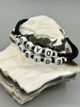 Load image into Gallery viewer, This set of Sarcastic Beaded Bracelets features fun and fashionable accessories perfect for any occasion. Crafted from metal wire and equipped with a hook-eye clasp, these sassy, sarcastic bracelets come in black and white and rainbow style. They are sure to make a statement. A fun addition to any accessory collection.   Measurements:  Black and White Color &quot;Dead Inside&quot;: 8 1/4&quot; in length  Rainbow Color &quot;U Suck&quot;: 8 1/2” in length 
