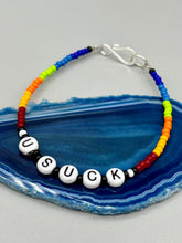 Load image into Gallery viewer, This set of Sarcastic Beaded Bracelets features fun and fashionable accessories perfect for any occasion. Crafted from metal wire and equipped with a hook-eye clasp, these sassy, sarcastic bracelets come in black and white and rainbow style. They are sure to make a statement. A fun addition to any accessory collection.   Measurements:  Black and White Color &quot;Dead Inside&quot;: 8 1/4&quot; in length  Rainbow Color &quot;U Suck&quot;: 8 1/2” in length 
