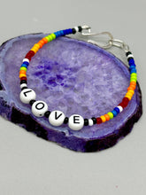 Load image into Gallery viewer, Rainbow Pride beaded bracelet LOVE Metal wire with hook-eye clasp.
