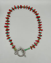 Load image into Gallery viewer, This uniquely designed Southwestern Style necklace is a mesmerizing blend of large bamboo red coral beads as well as turquoise and gold glass beads. The finishing touch is a beautiful large serpent toggle clasp.    Measurements:   Necklace is 25 1/2 " in length 
